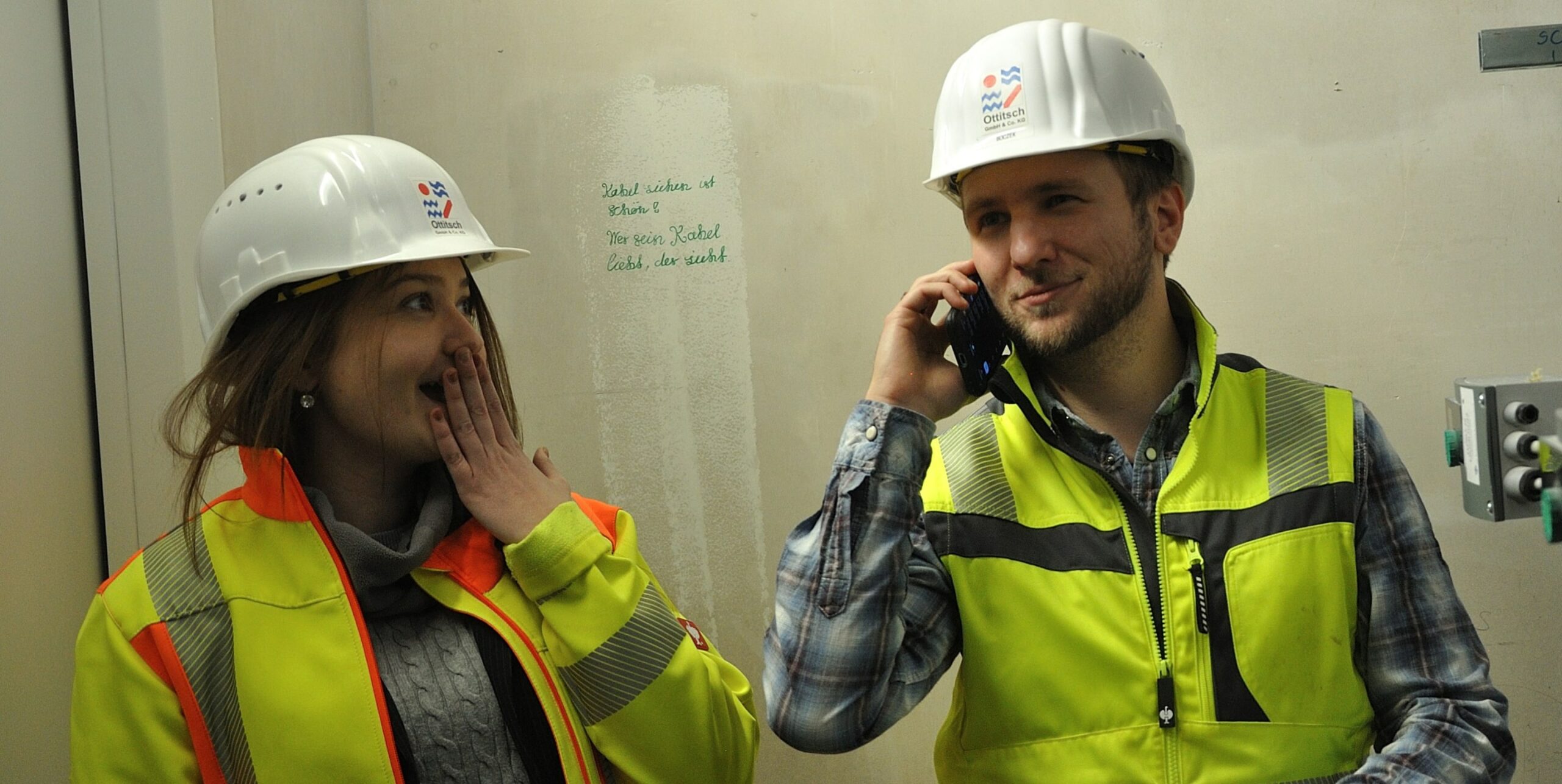 Mitarbeiter von Ottitsch in Arbeitskleidung